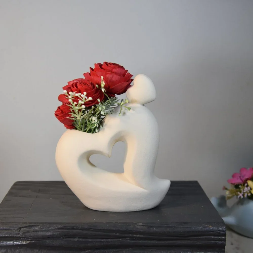 Sexy white curvy hearts vase with 4 red Sola wood roses that will last forever!
